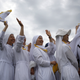 Nuns wave at Pope Francis from Haemi Castle in South Korea.